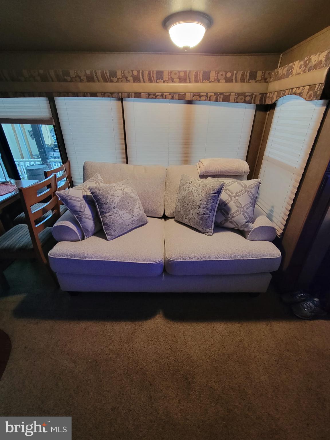 5 Bear Bottom Road Falling Waters, WV 25419 - Photo 24 of 27 a bed sitting in a bedroom next to a larger window