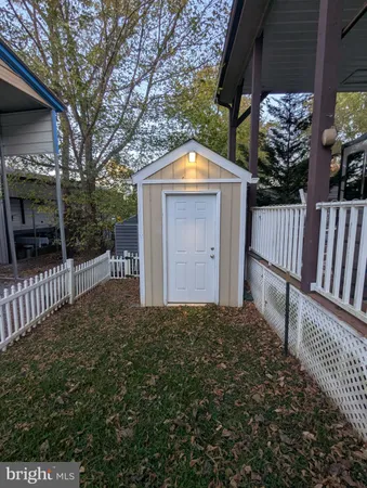 a view of a porch with furniture