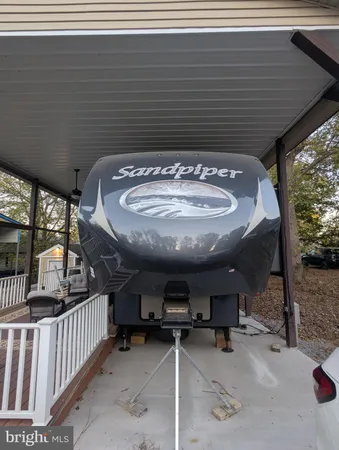 a view of house with a trees in the background