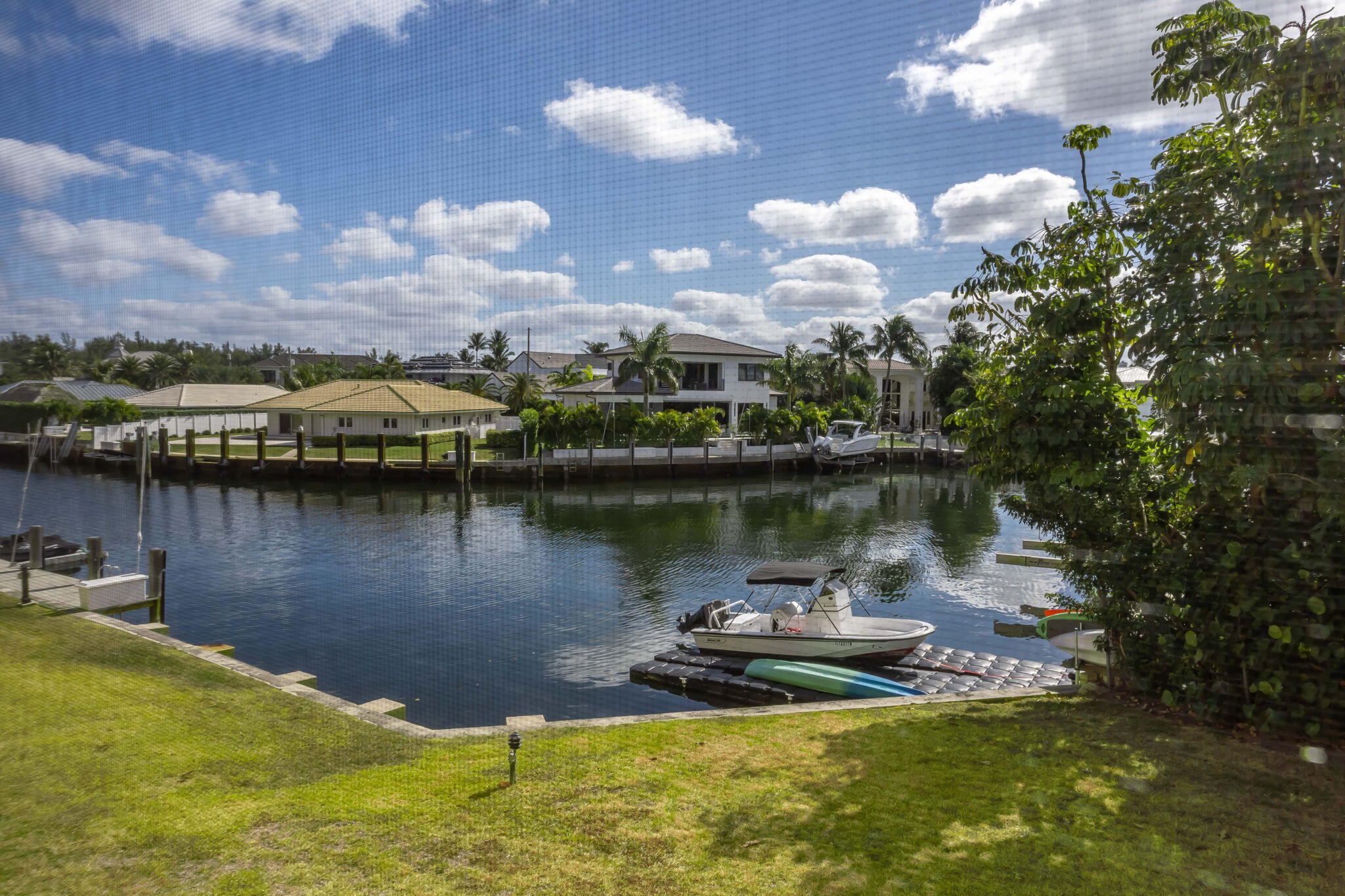 698 Northeast Spanish River Boulevard, Unit 24 Boca Raton, FL 33431 - Photo 13 of 25 a view of a lake in middle of the town