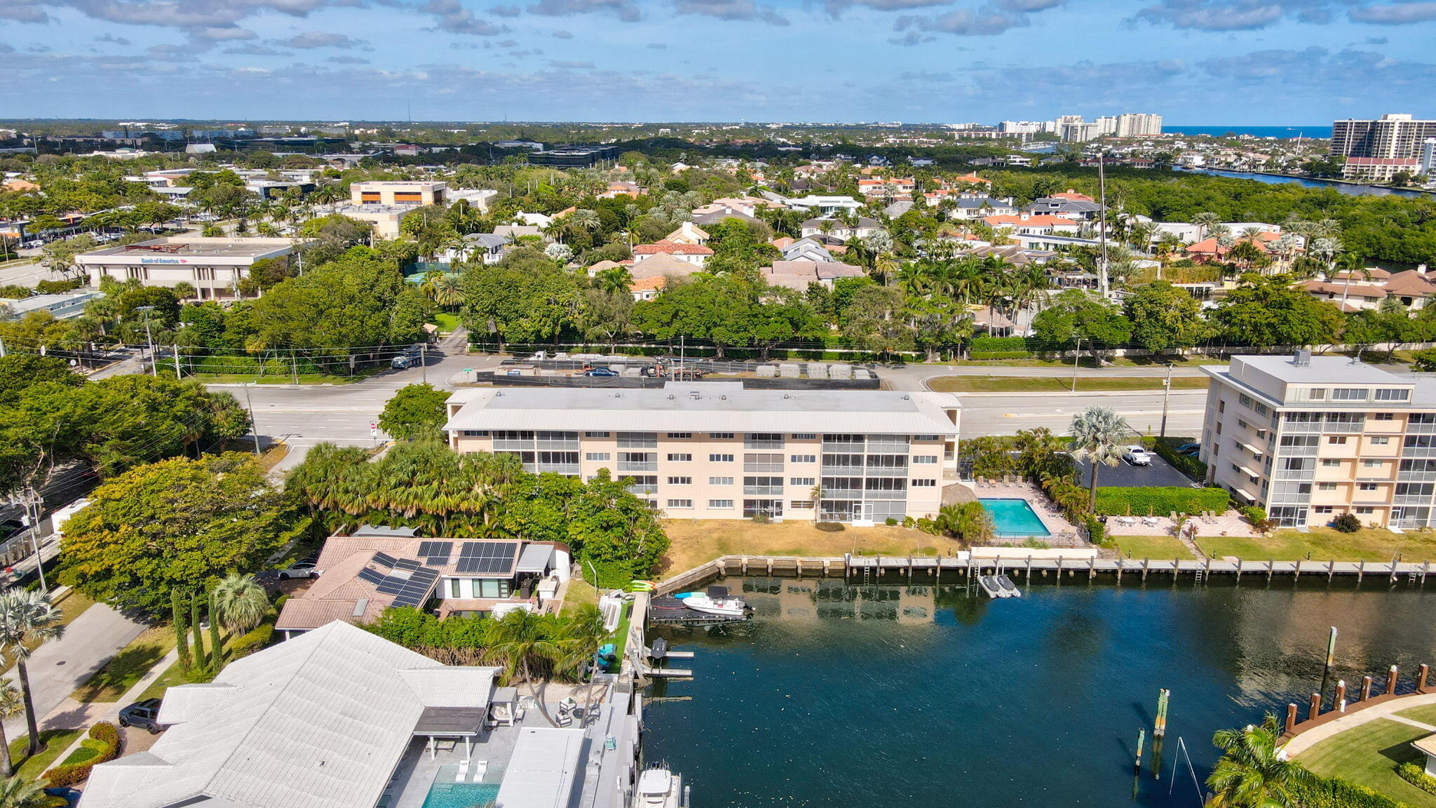 698 Northeast Spanish River Boulevard, Unit 24 Boca Raton, FL 33431 - Photo 22 of 25 an aerial view of residential houses with outdoor space and lake view