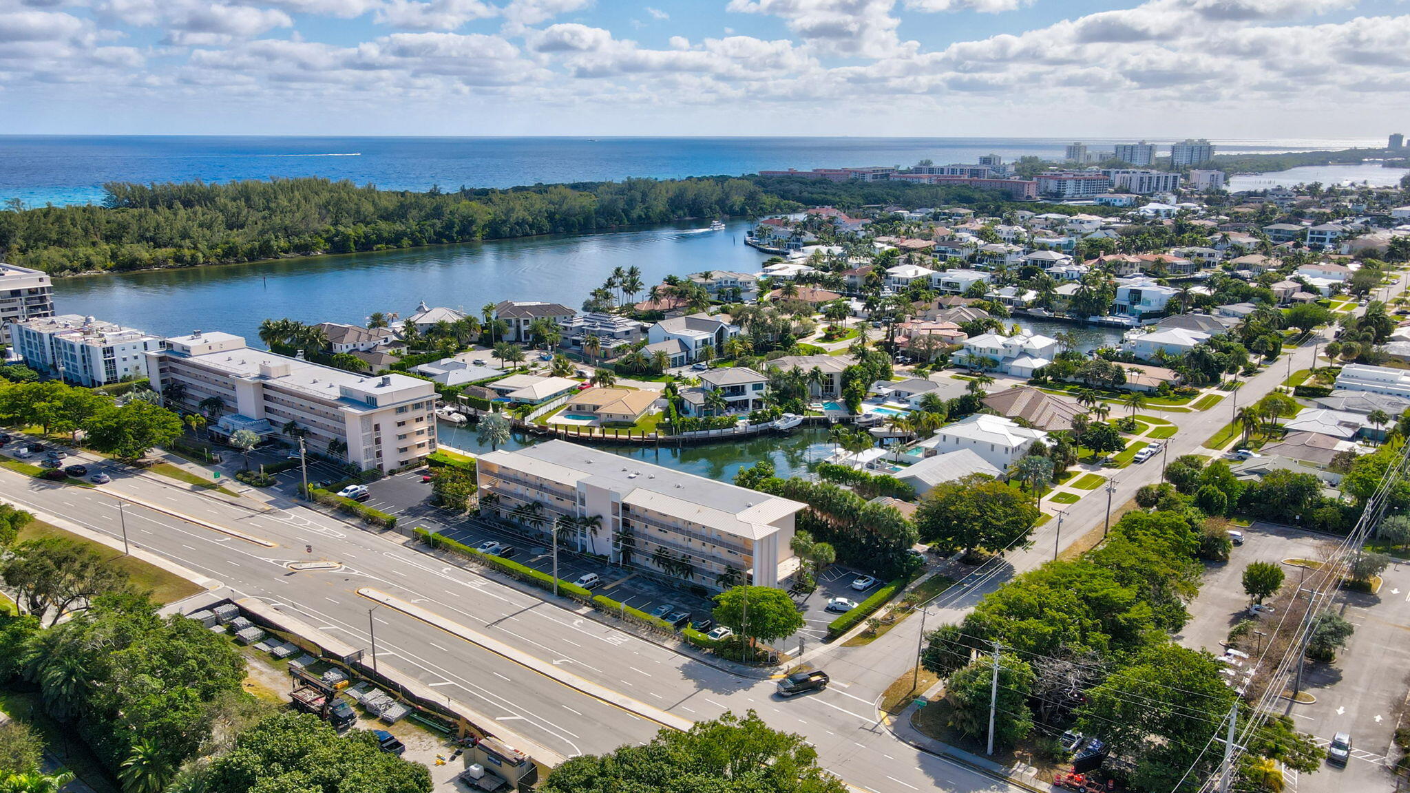 698 Northeast Spanish River Boulevard, Unit 24 Boca Raton, FL 33431 - Photo 24 of 25 an aerial view of a house with a lake view