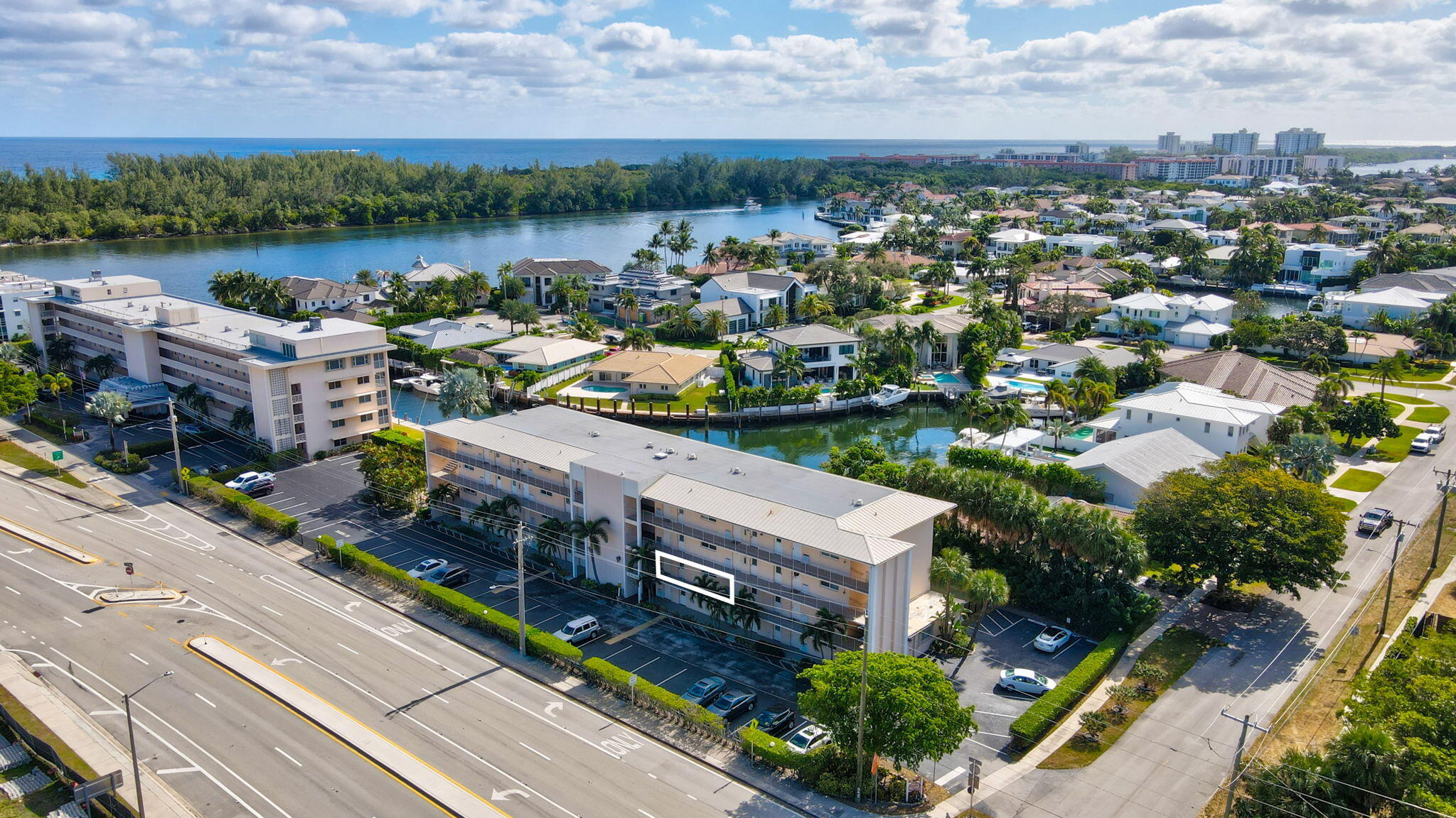 698 Northeast Spanish River Boulevard, Unit 24 Boca Raton, FL 33431 - Photo 25 of 25 an aerial view of a house with lake view