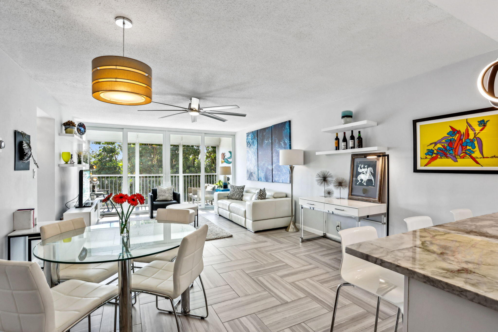 698 Northeast Spanish River Boulevard, Unit 24 Boca Raton, FL 33431 - Photo 7 of 25 a living room with furniture and a window