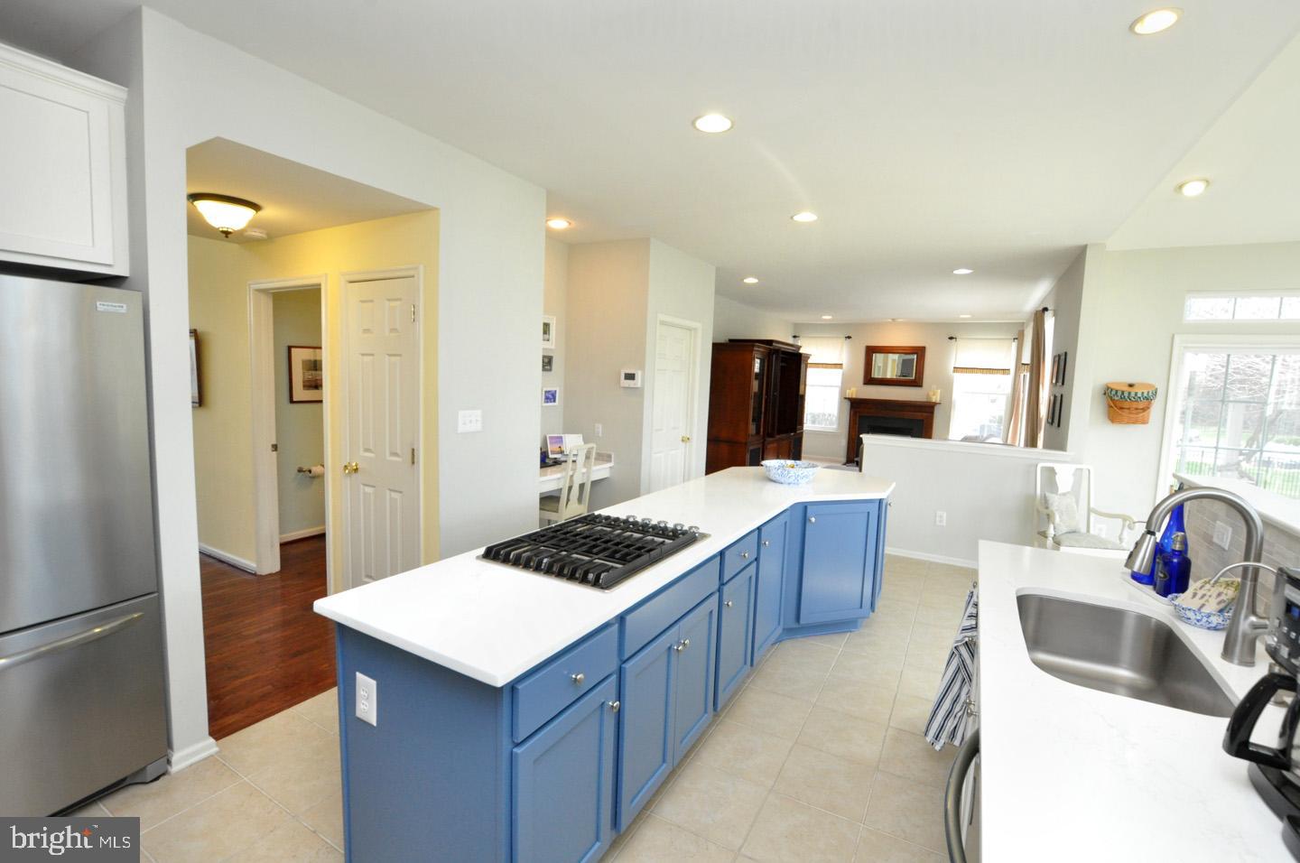 261 Jennings Way Mickleton, NJ 08056 - Photo 13 of 46 a kitchen with stainless steel appliances granite countertop a sink and a refrigerator