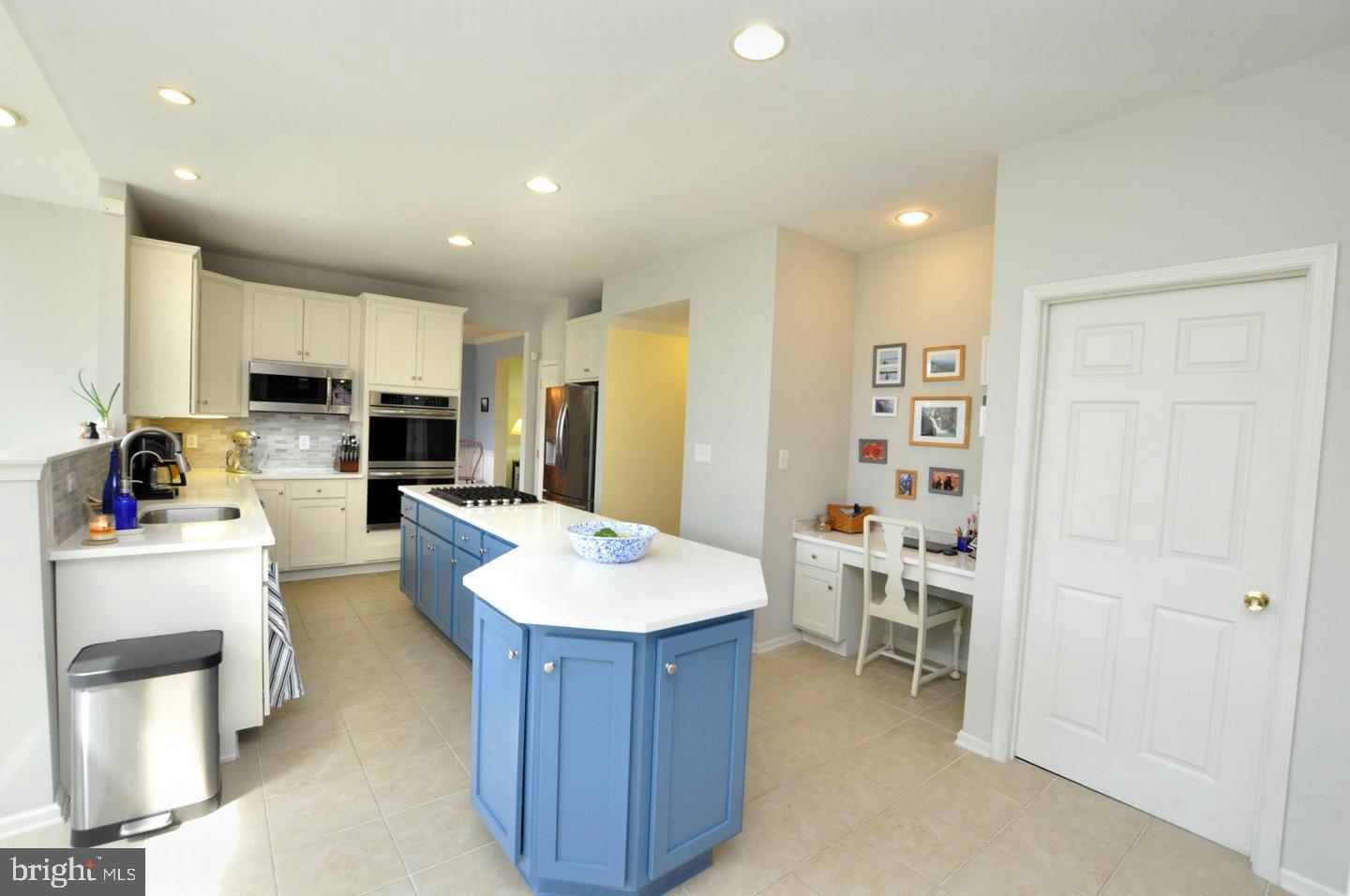 261 Jennings Way Mickleton, NJ 08056 - Photo 17 of 46 a large kitchen with a table and chairs