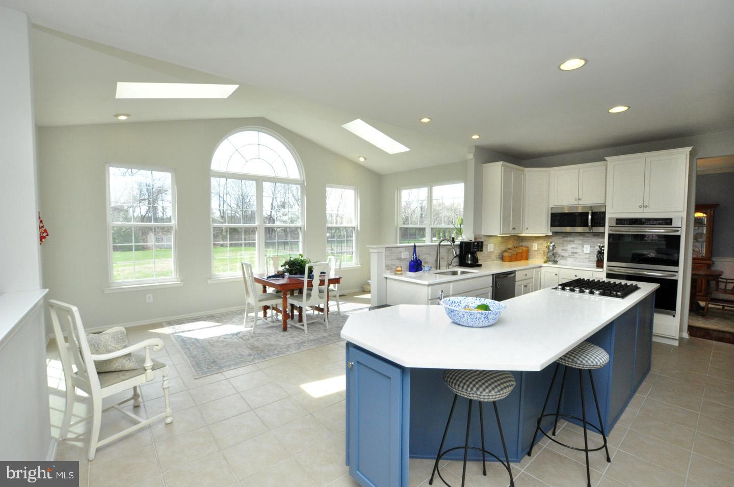 261 Jennings Way Mickleton, NJ 08056 - Photo 18 of 46 a view of a dining room with furniture and a large window