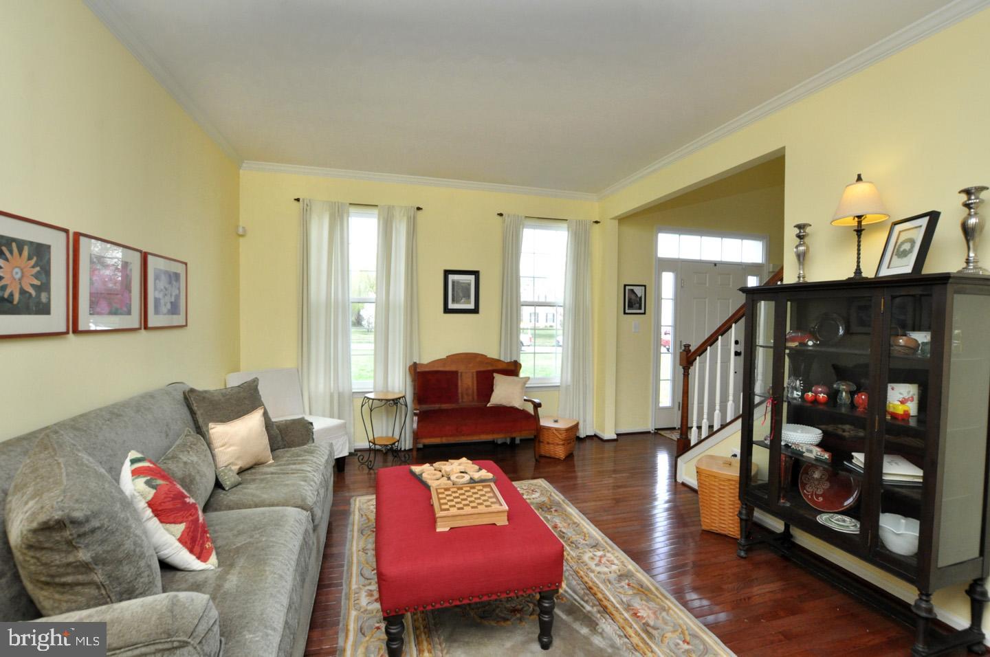 261 Jennings Way Mickleton, NJ 08056 - Photo 27 of 46 a living room with furniture and wooden floor