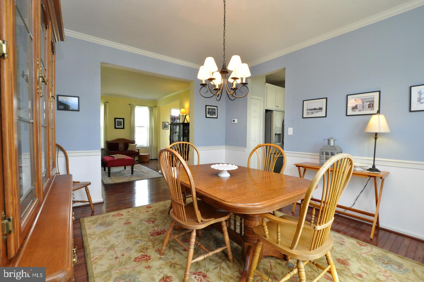 261 Jennings Way Mickleton, NJ 08056 - Photo 29 of 46 a view of a dining room with furniture and chandelier
