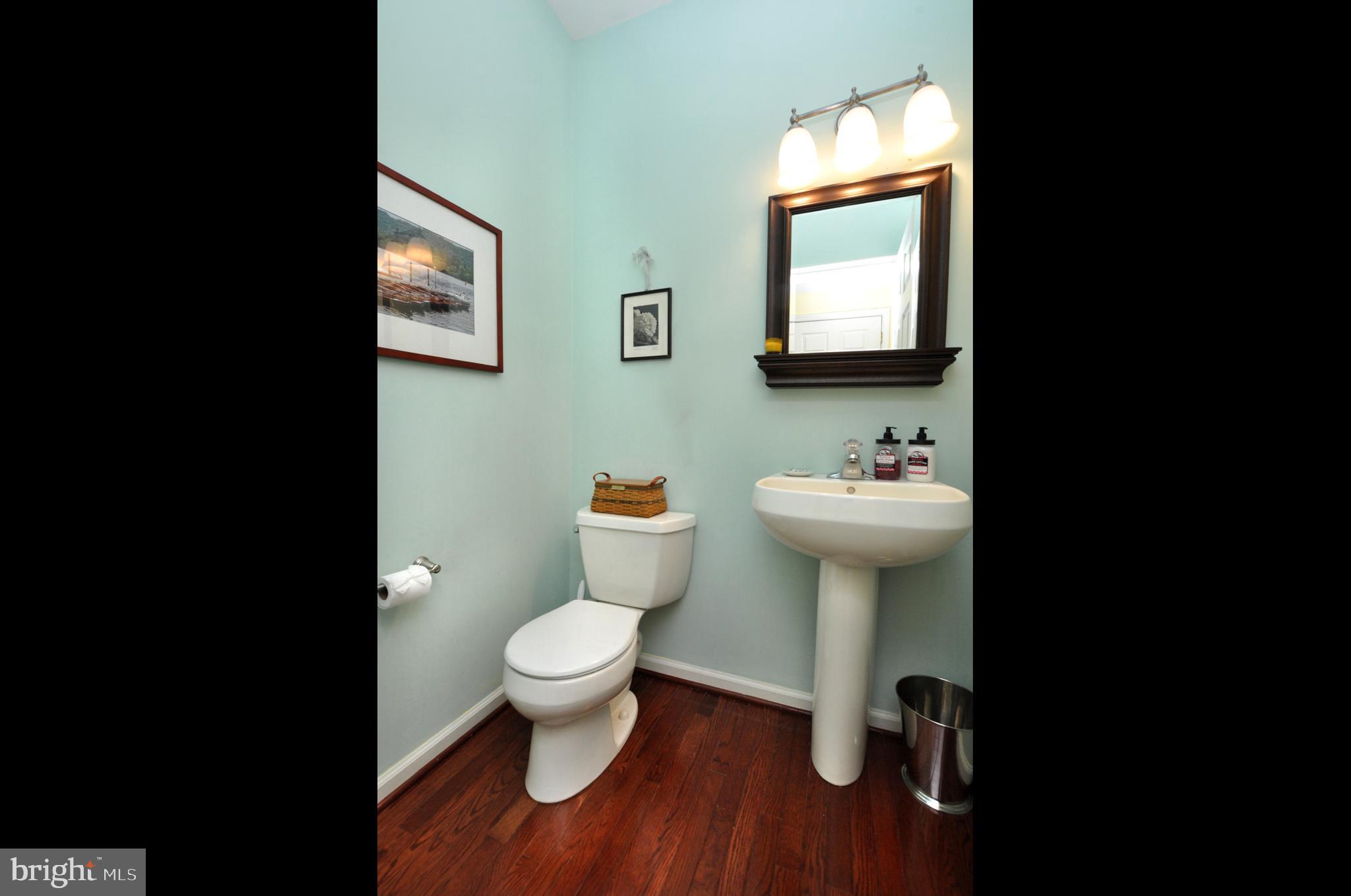 261 Jennings Way Mickleton, NJ 08056 - Photo 30 of 46 a bathroom with a sink toilet and a mirror