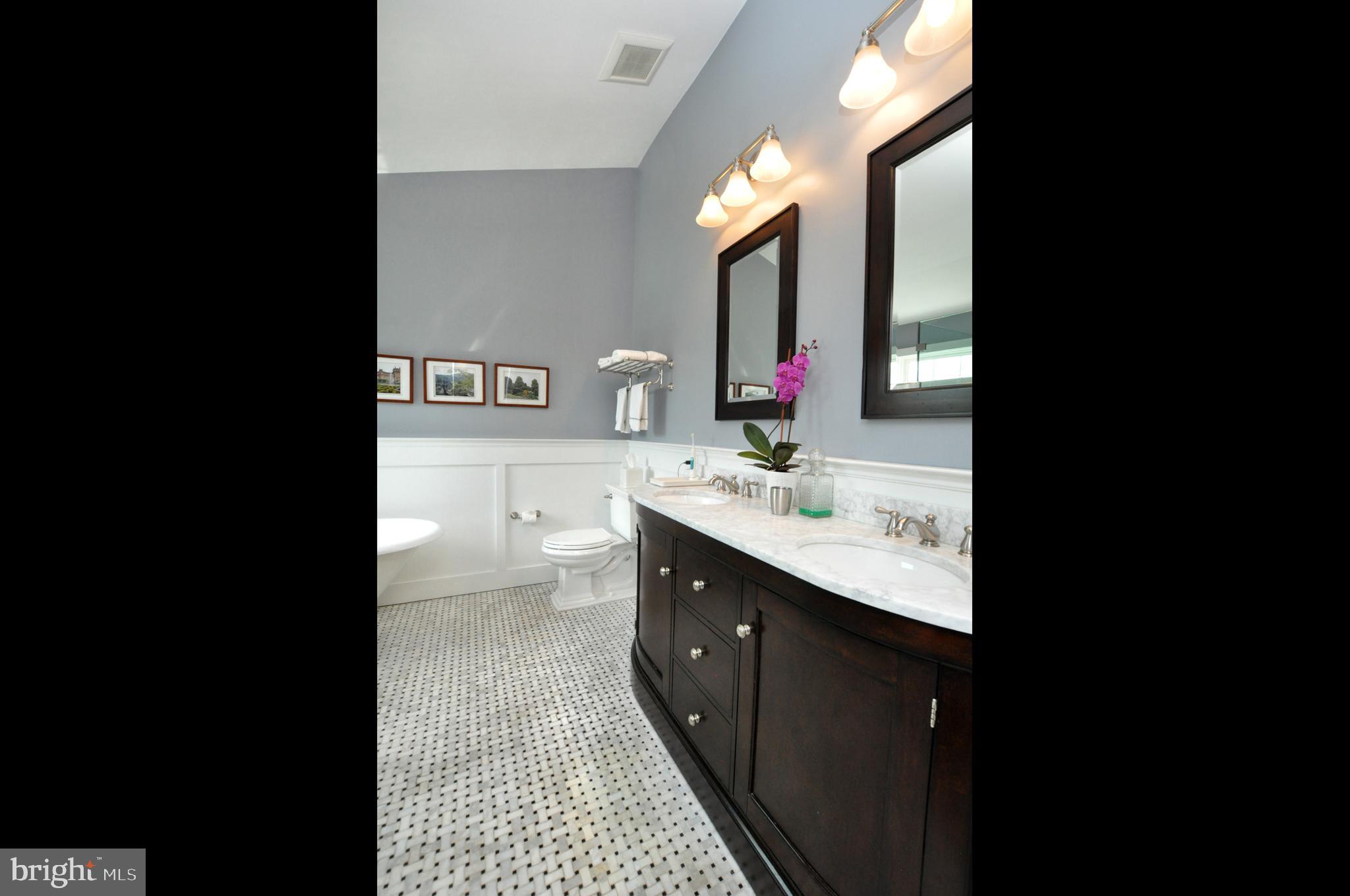 261 Jennings Way Mickleton, NJ 08056 - Photo 36 of 46 a bathroom with a double vanity sink and mirror