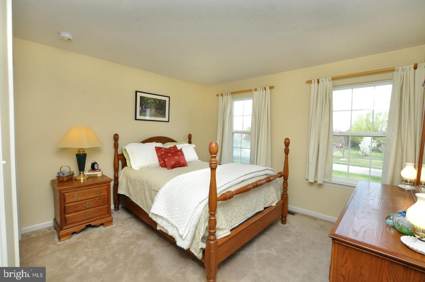 261 Jennings Way Mickleton, NJ 08056 - Photo 40 of 46 a bed room with a bed and a night stand