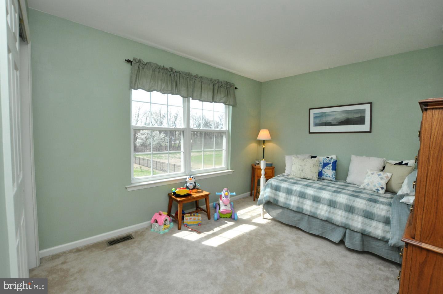 261 Jennings Way Mickleton, NJ 08056 - Photo 41 of 46 a bedroom with bed and a window