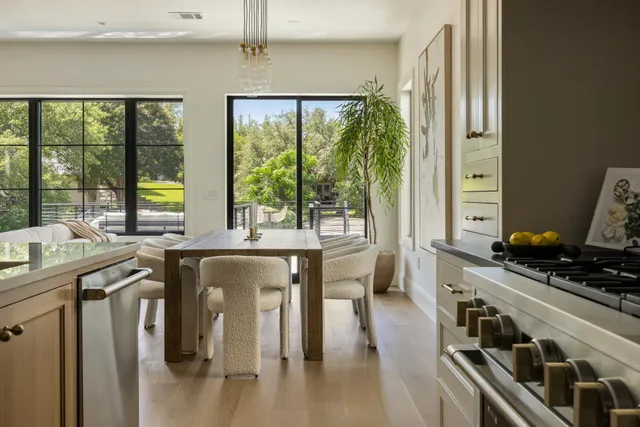 a view of a kitchen with furniture and window