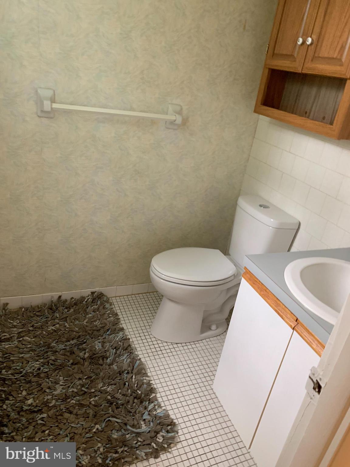 11902 Tarragon Road, Unit L Reisterstown, MD 21136 - Photo 26 of 39 New toilet in half bath