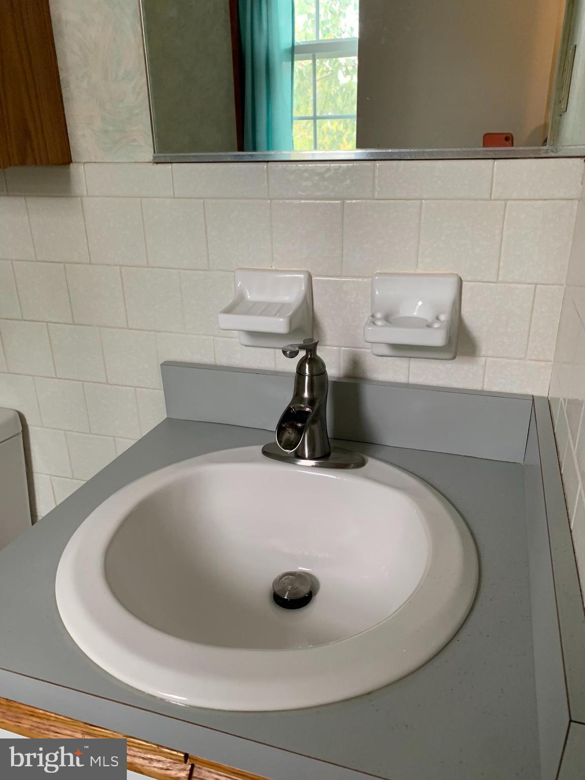 11902 Tarragon Road, Unit L Reisterstown, MD 21136 - Photo 27 of 39 New faucet in half bath