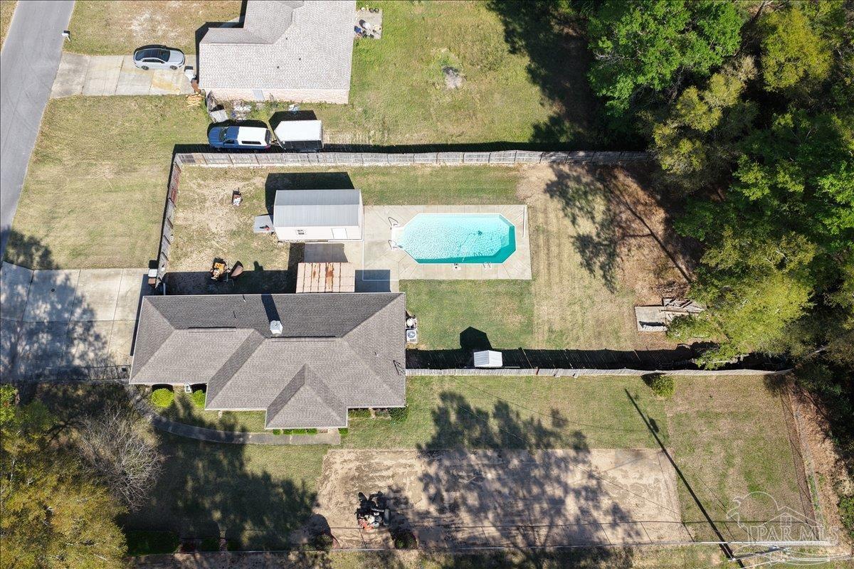 6892 Yucatan Street Milton, FL 32570 - Photo 41 of 41 an aerial view of residential houses with outdoor space