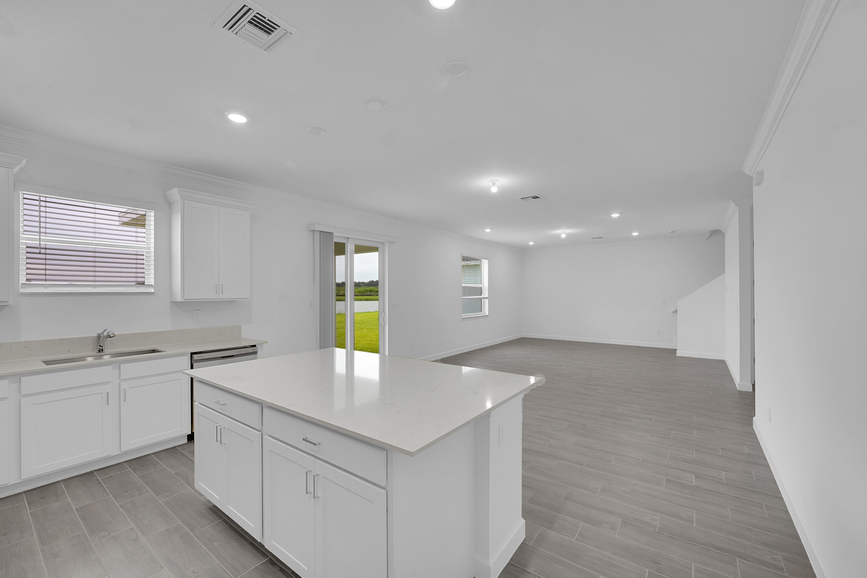 3514 Angler Drive Fort Pierce, FL 34946 - Photo 14 of 32 a view with cabinets a sink and dishwasher in a room