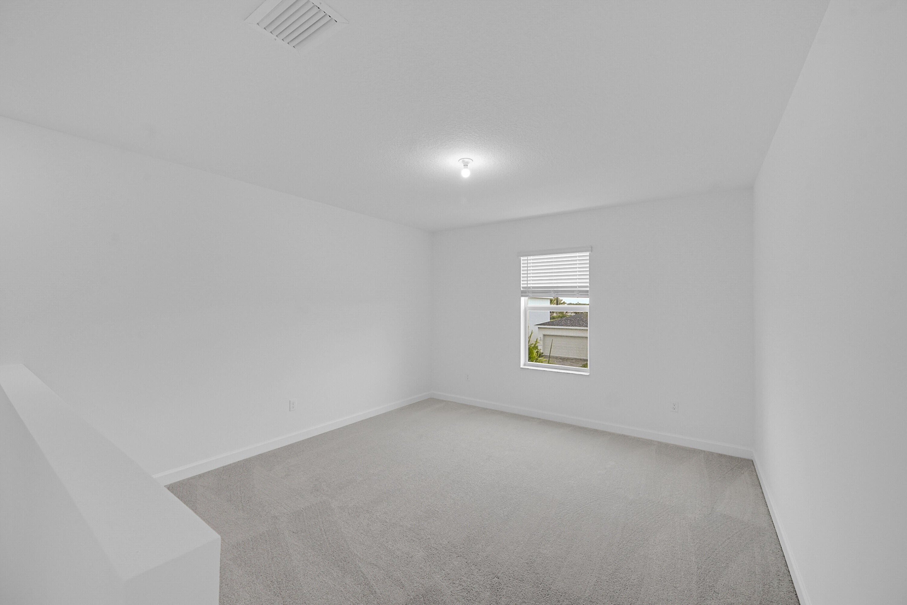 3514 Angler Drive Fort Pierce, FL 34946 - Photo 15 of 32 an empty room with a window