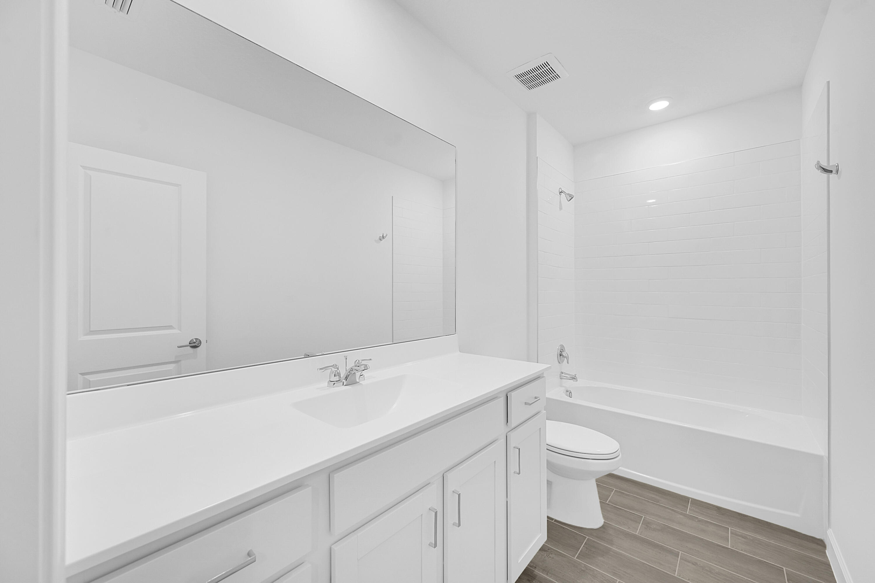 3514 Angler Drive Fort Pierce, FL 34946 - Photo 24 of 32 a bathroom with a sink a toilet and shower