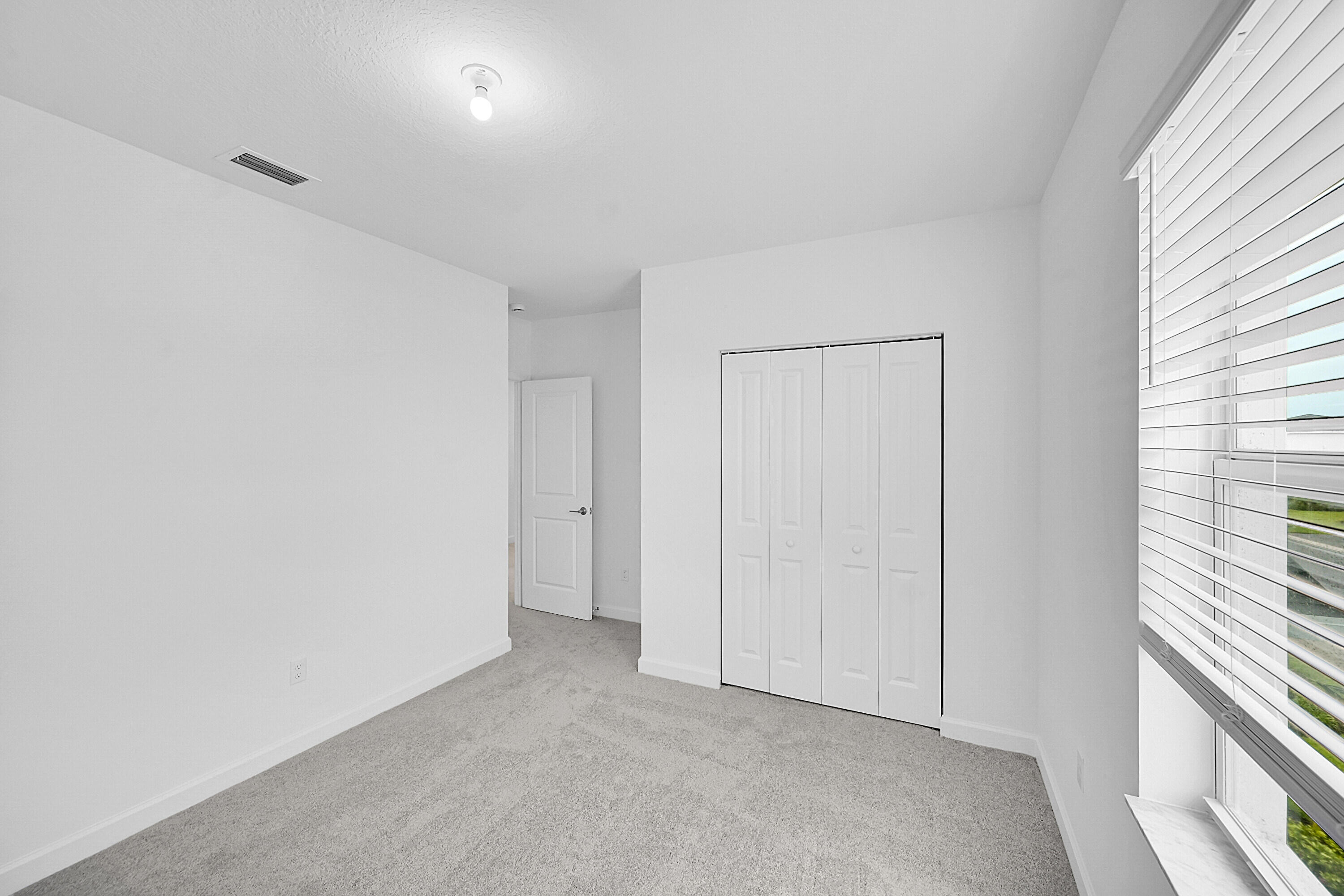 3514 Angler Drive Fort Pierce, FL 34946 - Photo 25 of 32 a view of an empty room and a window