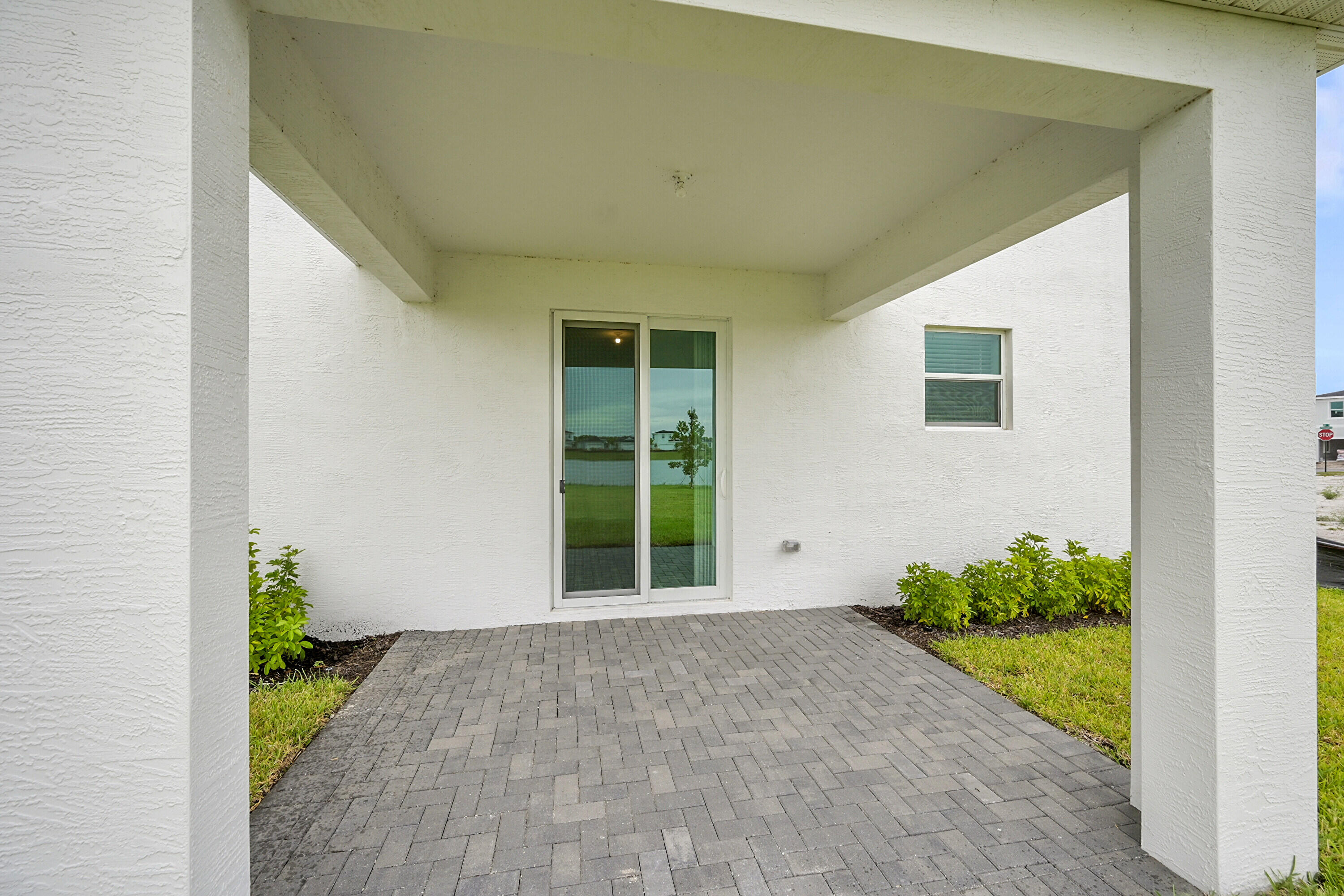 3514 Angler Drive Fort Pierce, FL 34946 - Photo 29 of 32 a front view of a house with a yard