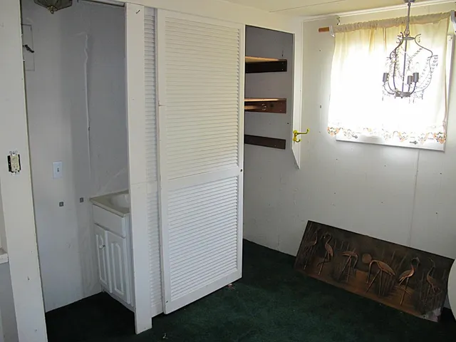 a view of walk in closet with window