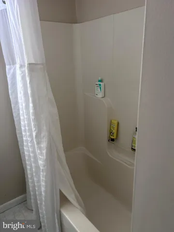 a bathroom with a bathtub