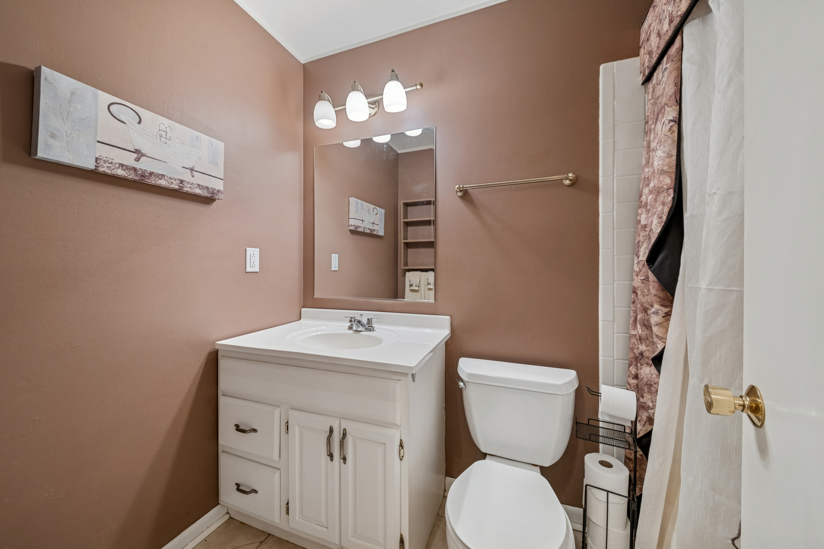 532 Shabbona Trail Batavia, IL 60510 - Photo 11 of 19 a bathroom with a toilet sink and mirror