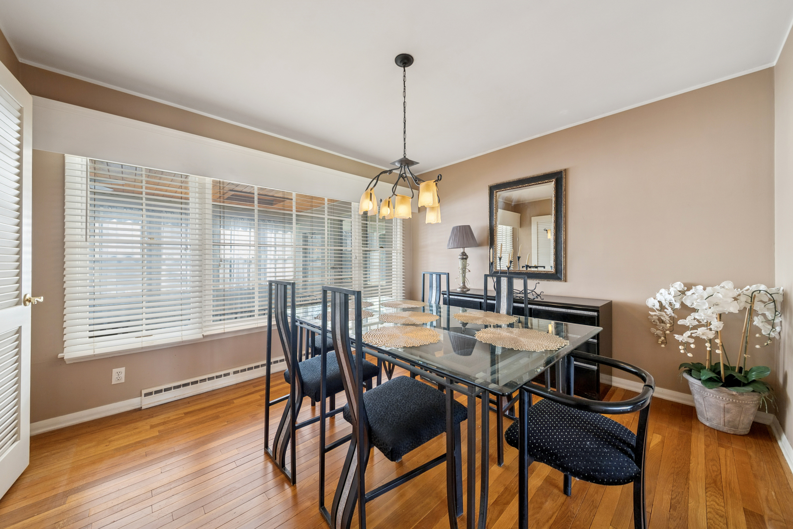 532 Shabbona Trail Batavia, IL 60510 - Photo 5 of 19 a view of a dining room with furniture window and wooden floor