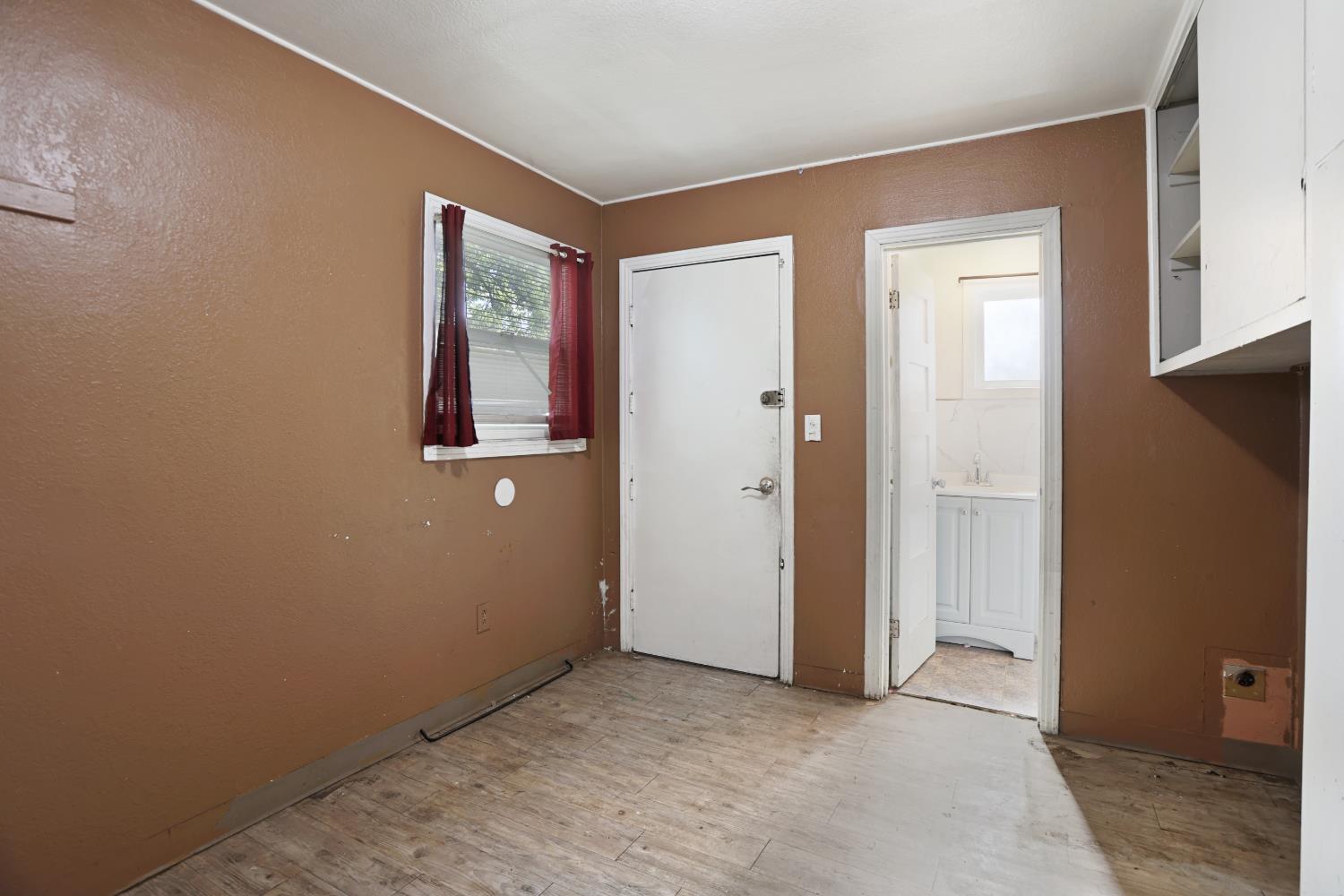 2018 East Myrtle Street Stockton, CA 95205 - Photo 22 of 41 an empty room with windows and closet
