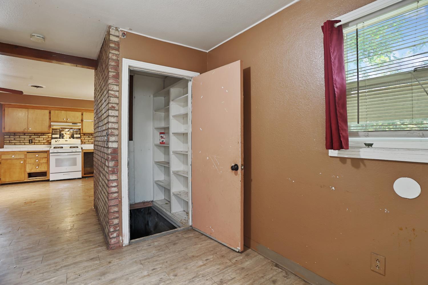 2018 East Myrtle Street Stockton, CA 95205 - Photo 24 of 41 a view of a kitchen cabinets and a wooden floor