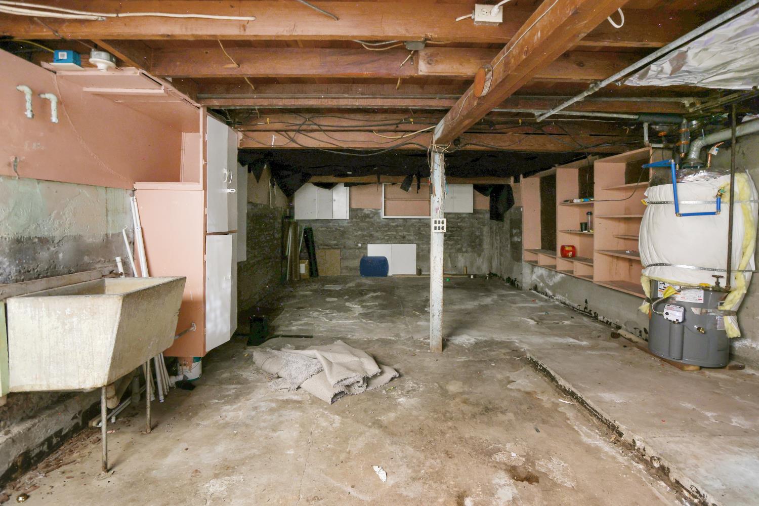 2018 East Myrtle Street Stockton, CA 95205 - Photo 34 of 41 a view of a garage with wooden table and chairs
