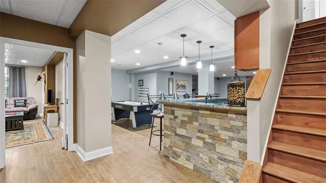 a view of a living room and entry way