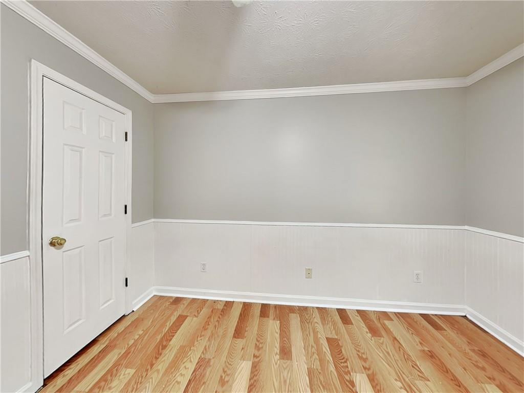 2140 Kings Gate Circle Southwest, Unit B Snellville, GA 30078 - Photo 13 of 18 a view of an empty room