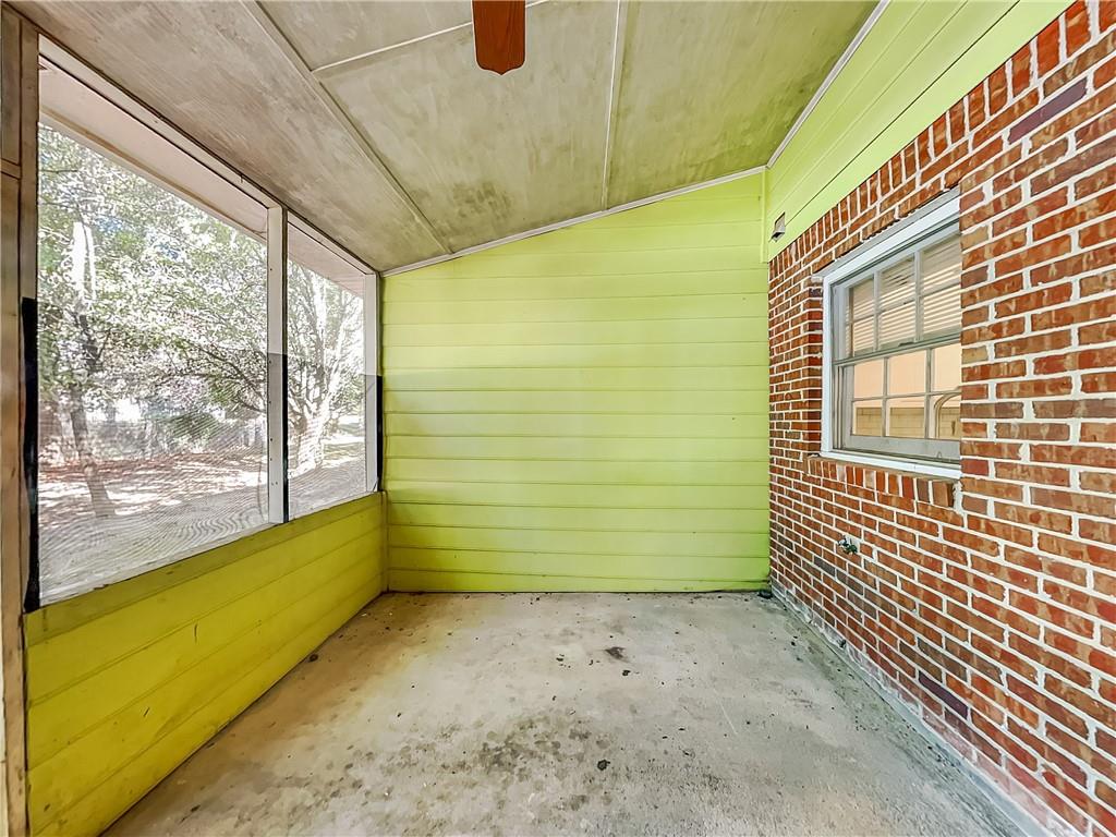 2140 Kings Gate Circle Southwest, Unit B Snellville, GA 30078 - Photo 16 of 18 a view of a room with windows