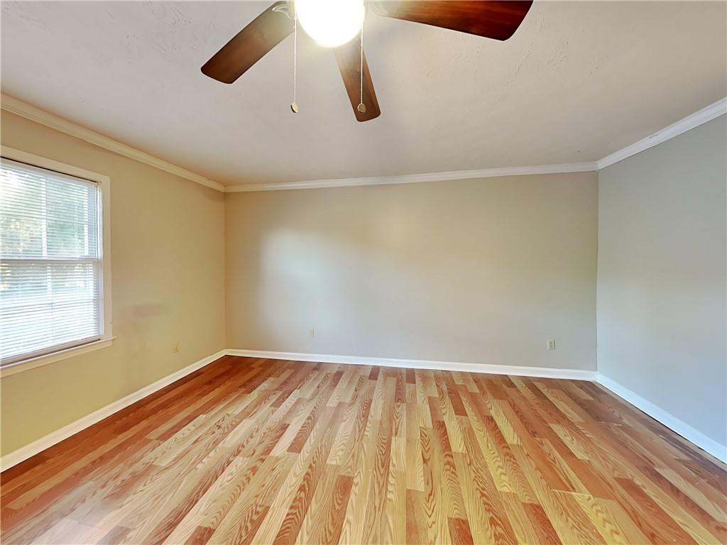2140 Kings Gate Circle Southwest, Unit B Snellville, GA 30078 - Photo 5 of 18 wooden floor in a room