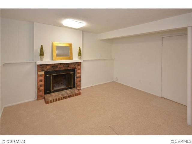 13810 Sutters Mill Road Midlothian, VA 23112 - Photo 9 of 12 a view of empty room with a fireplace