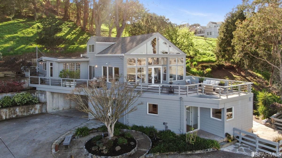 a view of a house with a garden
