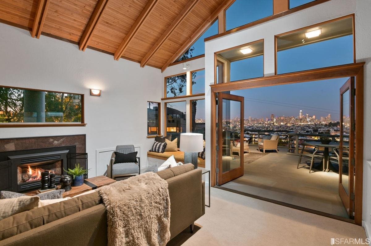 1502 Shotwell Street San Francisco, CA 94110 - Photo 11 of 61 a living room with furniture and a fireplace