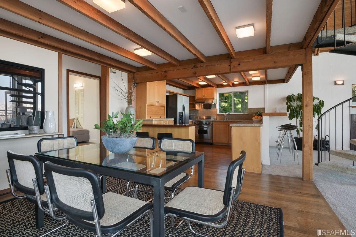1502 Shotwell Street San Francisco, CA 94110 - Photo 17 of 61 a view of a dining room with furniture window and wooden floor