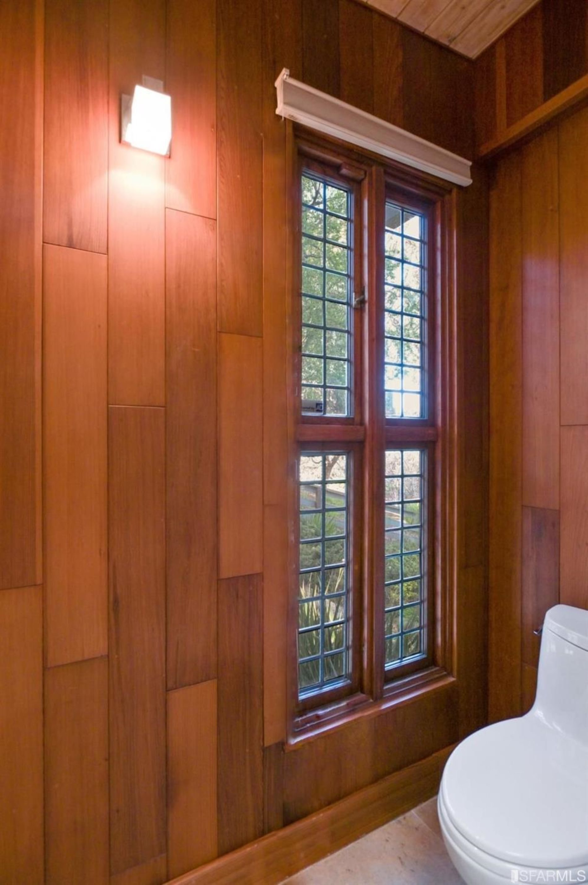 1502 Shotwell Street San Francisco, CA 94110 - Photo 27 of 61 a bathroom with a toilet a sink and shower