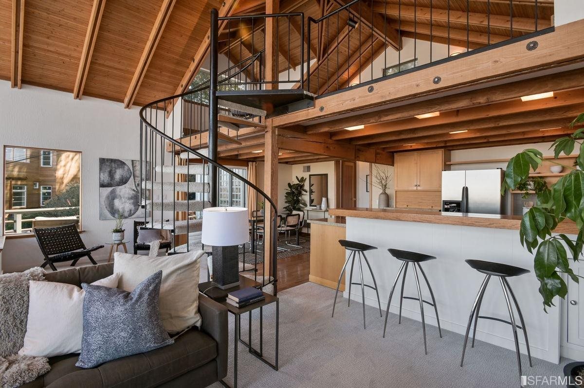 1502 Shotwell Street San Francisco, CA 94110 - Photo 28 of 61 a living room with furniture and a chandelier