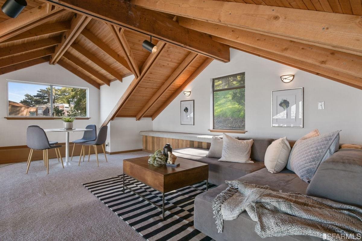 1502 Shotwell Street San Francisco, CA 94110 - Photo 31 of 61 a living room with furniture and a table