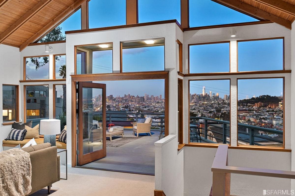 1502 Shotwell Street San Francisco, CA 94110 - Photo 40 of 61 a living room with furniture and a window
