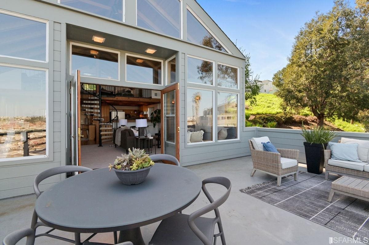 1502 Shotwell Street San Francisco, CA 94110 - Photo 42 of 61 a view of a patio with table and chairs