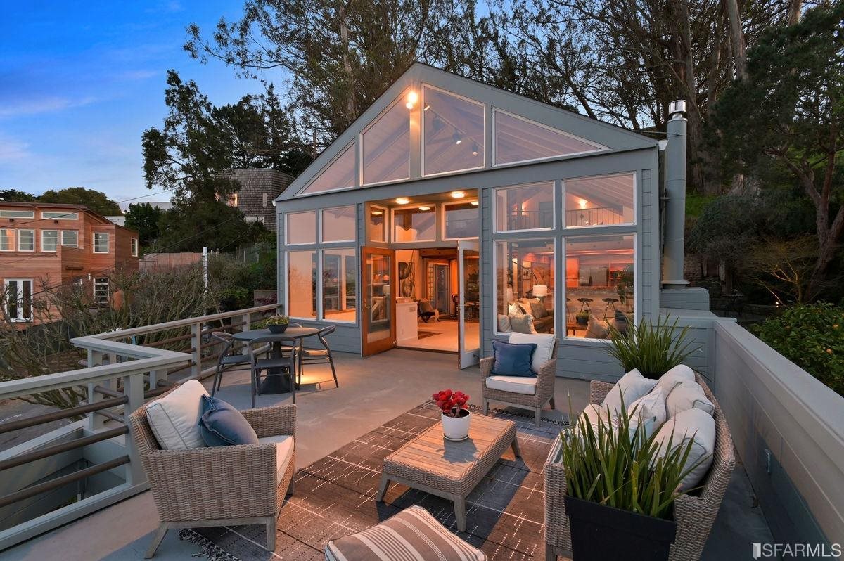 1502 Shotwell Street San Francisco, CA 94110 - Photo 43 of 61 a view of a patio with couches chairs and a fire pit