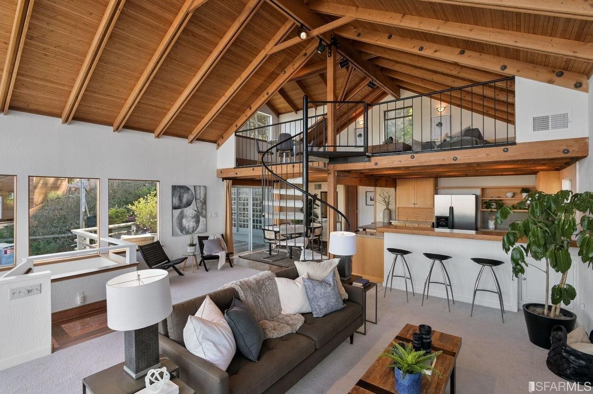 1502 Shotwell Street San Francisco, CA 94110 - Photo 5 of 61 a living room with furniture and a large window