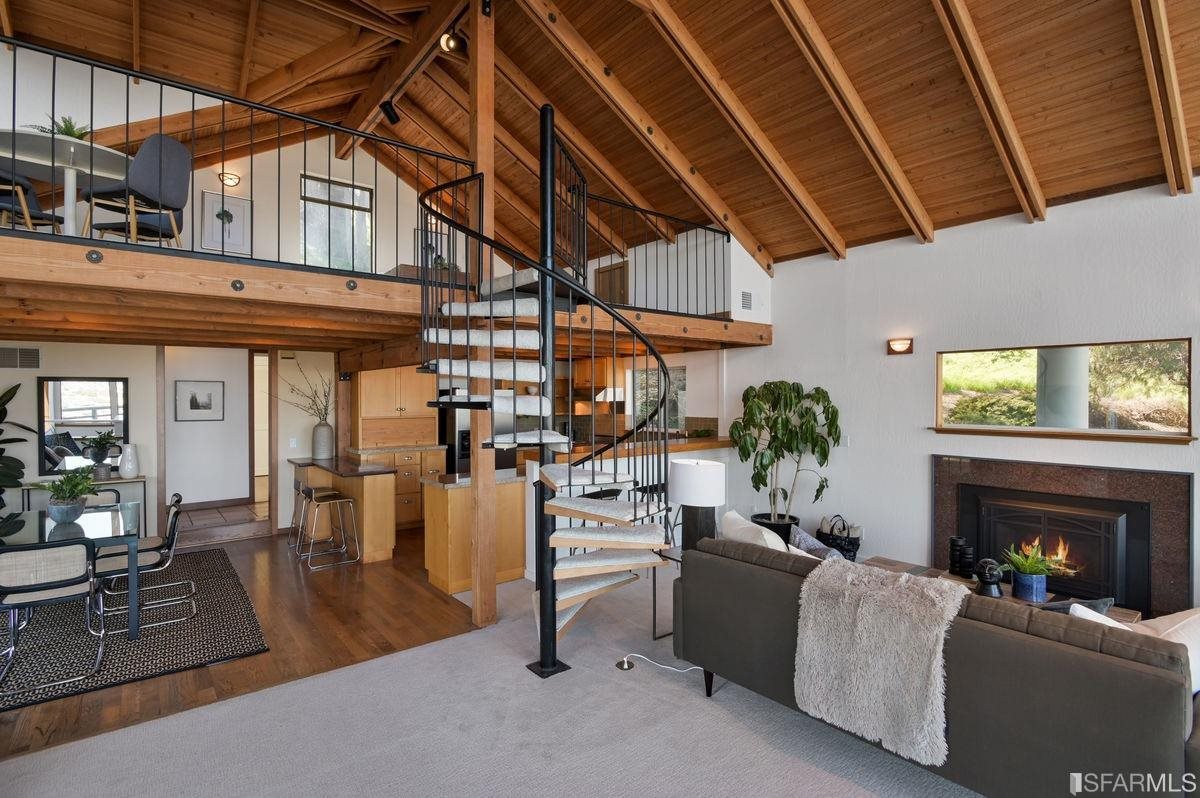 1502 Shotwell Street San Francisco, CA 94110 - Photo 6 of 61 a living room with furniture and a fireplace