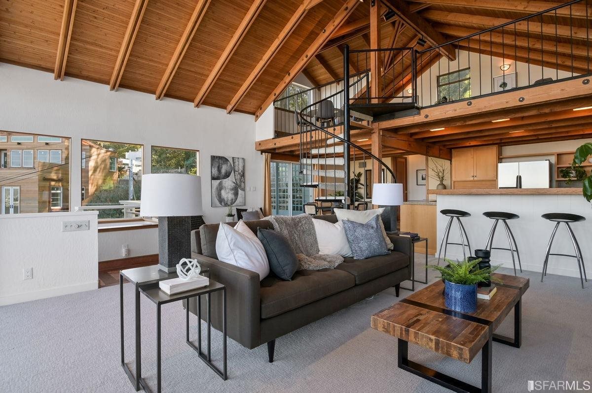 1502 Shotwell Street San Francisco, CA 94110 - Photo 7 of 61 a living room with furniture and a chandelier